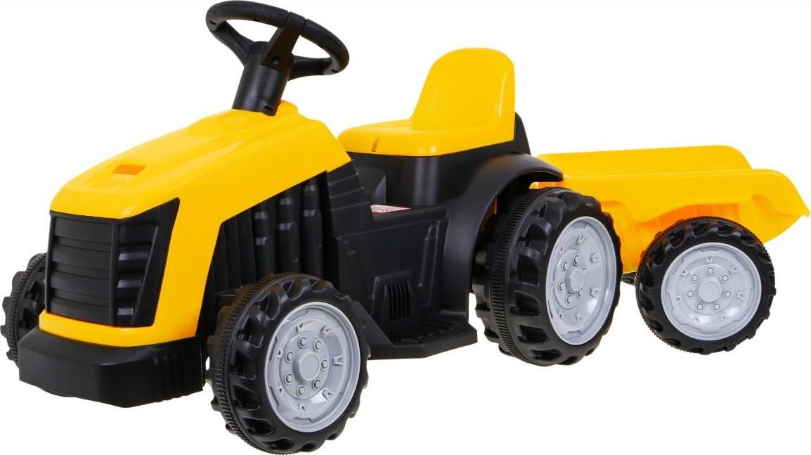 Traktor se žlutým přívěsem