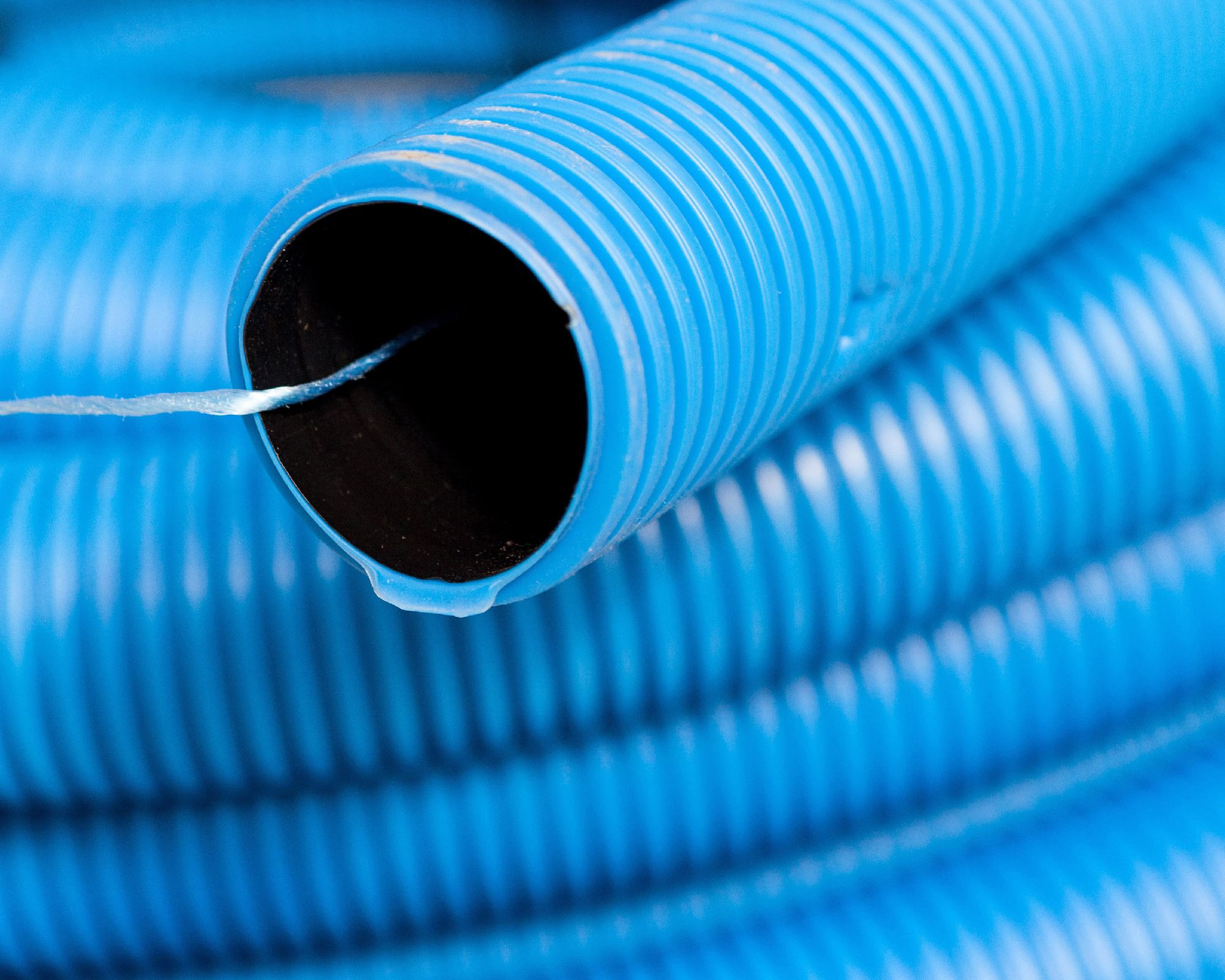 Kopos Vlnitá plášťová trubka modrá 40mm KF (25M/2625M)